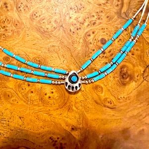 Native American style choker with turquoise and silver beads.